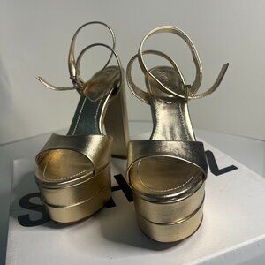 Schultz brand new platform metallic sandals